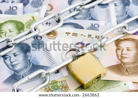Chain and lock over Chinese currency depicting currency control
