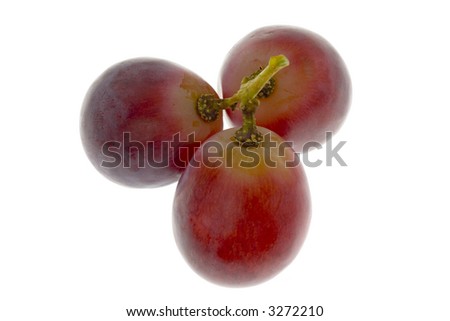 Three Red Globe grapes isolated on white background