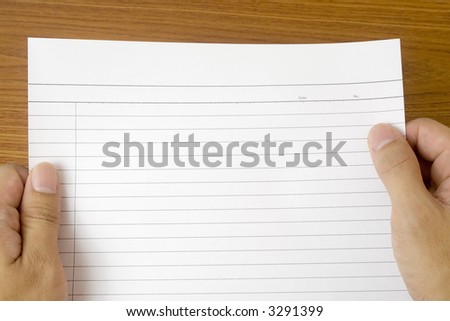 "a piece of blank paper" or "a blank piece of paper 