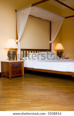 Four poster bed in a resort hotel room