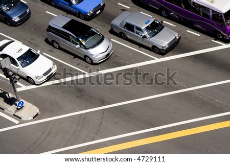 Cars stopped at a traffic junctions