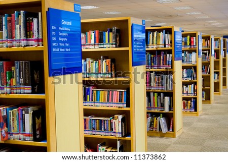 stock photo : Interior of a library showing rows of books