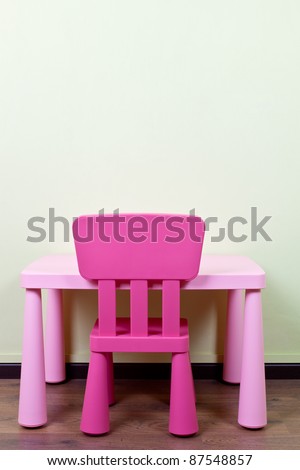 Pink Color Kids Desk And Chair Against A Blank Wall Stock Photo ...