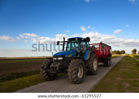 Tractor on the road with trailer