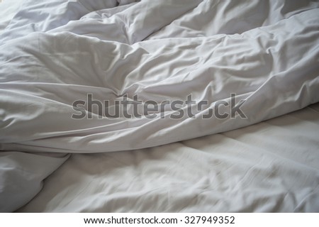 close up of messy bedding sheets