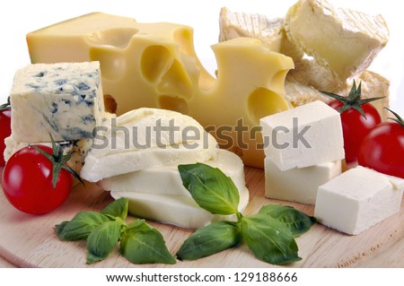 set of cheese on a wooden board