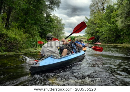 Sula, Ukraine - June 14, 2014: river rafting kayaking editorial photo; river, Sula, 2014 Ukraine, June 14