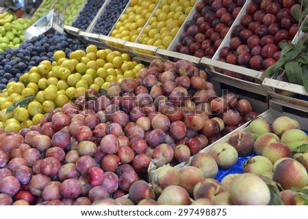 plums and peaches on display