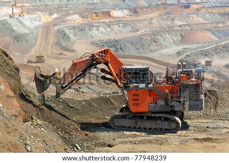 The big dredge digs the earth
