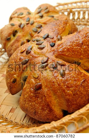 bread with pumpkin seeds in a wicker basket