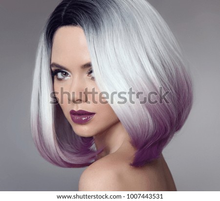 Ombre bob short hairstyle. Beautiful hair coloring woman. Trendy haircut. Blond model with short shiny hairstyle. Concept Coloring Hair. Beauty Salon.