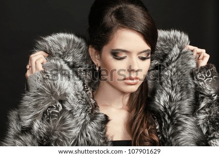 Fashion woman in fur coat, lady portrait