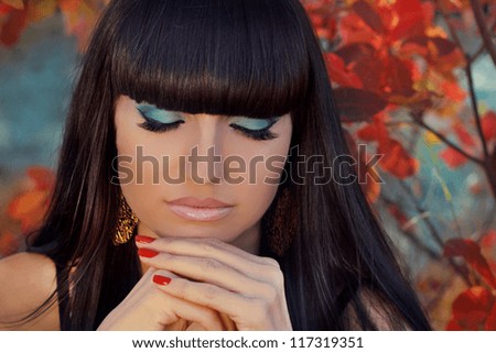 Autumn Woman Fashion Portrait. Eyes Makeup. Beautiful Girl. Fashion Art.