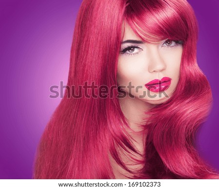 Red Long Glossy Hair. Beautiful Fashion Woman Portrait. Bright Makeup. Coloring Haired