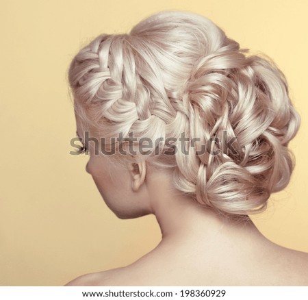 Beauty wedding hairstyle. Bride. Blond girl with curly hair styling