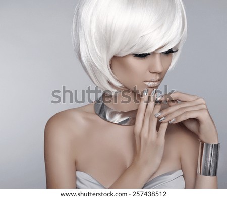 White Short Hair. Fashion stylish blond girl model. Haircut. Hairstyle. Fringe. Glamour woman Isolated on grey Background.