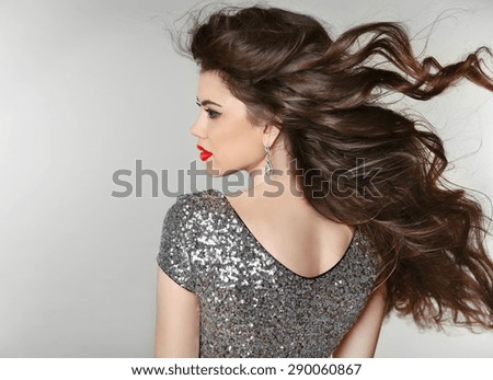 Hair. Beautiful Brunette Girl. Healthy Long Hair. Beauty Model Woman. Blowing Hairstyle.
