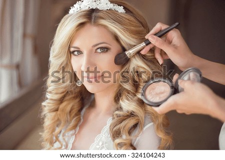 make up rouge. Healthy hair. beautiful smiling bride wedding portrait. Stylish makes makeup Young woman with long curly hair style.