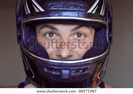 man in crash helmet motor