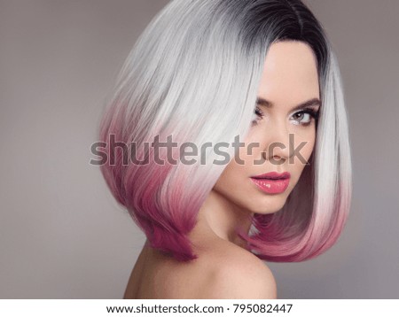 Ombre bob short hairstyle. Beautiful hair coloring woman. Fashion Trendy haircut. Blond model with short shiny hairstyle. Concept Coloring Hair. Beauty Salon.