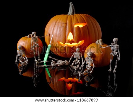Skeleton as the pumpkin carving crew