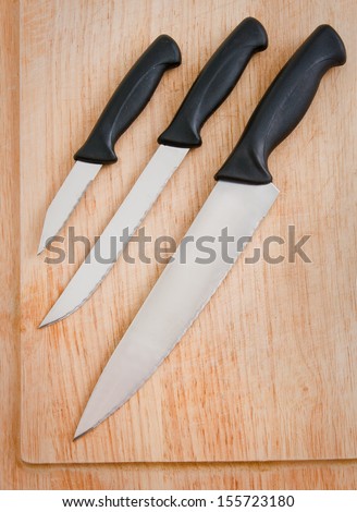 Carving knife set on cutting board