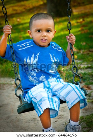 Little Boy on Park Swing