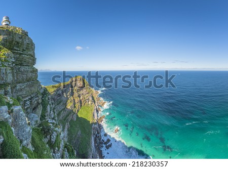 Cape Point landscape, located near the city of Cape Town, South Africa. The peninsula has towering rock cliffs that overlook the beautiful ocean view. A tourism and travel hot spot.