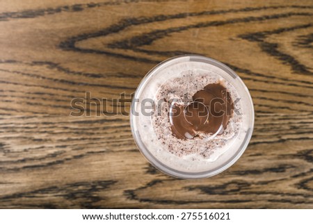 Top view Chocolate smoothie on rustic wooden table
