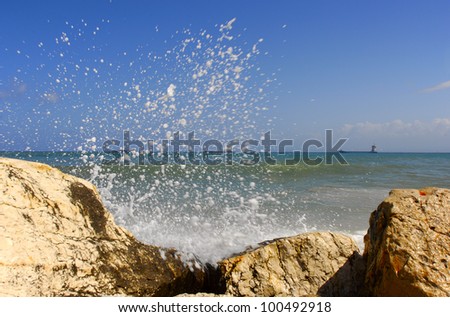 Splash of breaking waves & ship