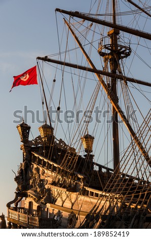 detail of the back of a pirate ship in Genoa at sunset
