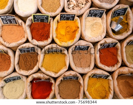 colorful spices in cloth bags in a shop