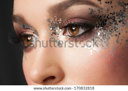 Eye Makeup. Closeup Of Beautiful Woman Eye With Glitter Makeup. Fancy Makeup, False Eyelashes