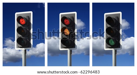 three traffic lights showing sequence red amber green