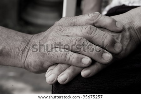 holding old hand
