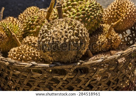 Basket of spiky and smelly Durian for sale in a local market