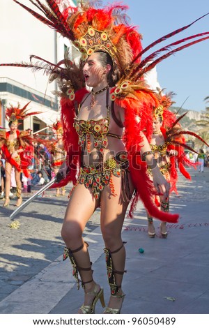 SESIMBRA, PORTUGAL - FEBRUARY 20: Samba dancer in the Sesimbra Carnival – equal to the Brazilian Carnival on February 20, 2012 in Sesimbra, Portugal.