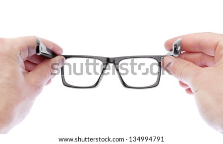 A man wearing glasses to improve vision. On a white background.