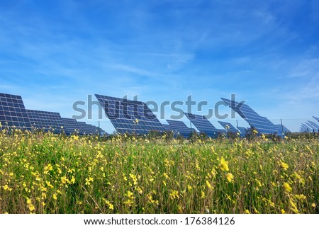 Station solar panels on a beautiful green lawn. For the generation of electricity.