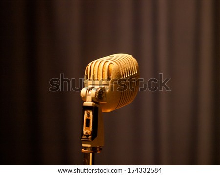 vintage audio microphone against the background