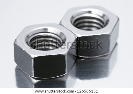 metal nuts for Industrial products on silver background