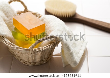 Body brush and soap enters the basket
