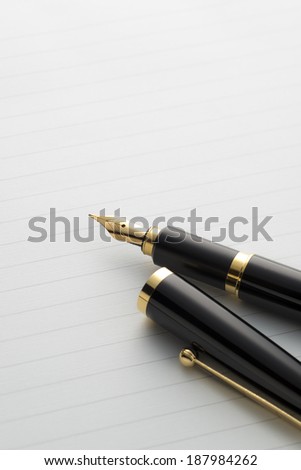 fountain pen on letter paper