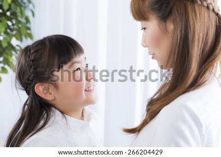 mother and daughter is talking