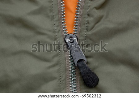 Zipper of a green jacket