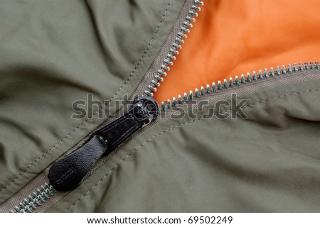 Zipper of a green jacket