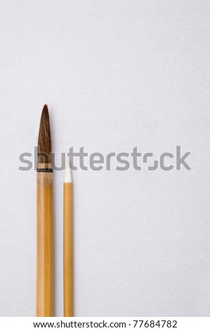 Writing brush on white paper