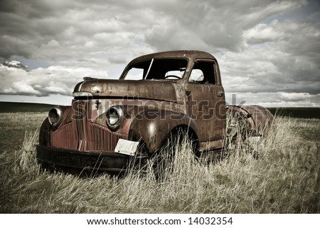 stock photo Old truck out in the field