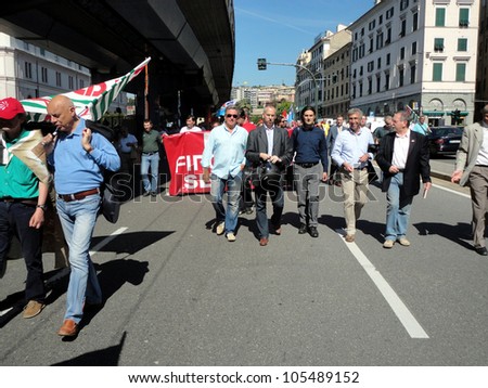 GENOA, ITALY - JUNE 15: strike of the workers of the group finmeccanica against the sale of some firms of the group,also the mayor of Genoa (center with helmet) June 15, 2012 in Genoa, Italy