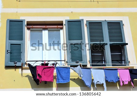 windows and clothes hanging in Camogli, Genoa, Italy